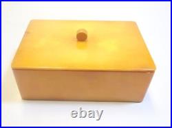 Boîte en bakélite art déco jaune