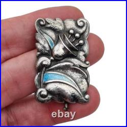 Broche Art déco en argent avec émail bleu, style floral Art Nouveau, vers 1920 Broche Art déco en argent avec émail bleu, style floral Art Nouveau, vers 1920